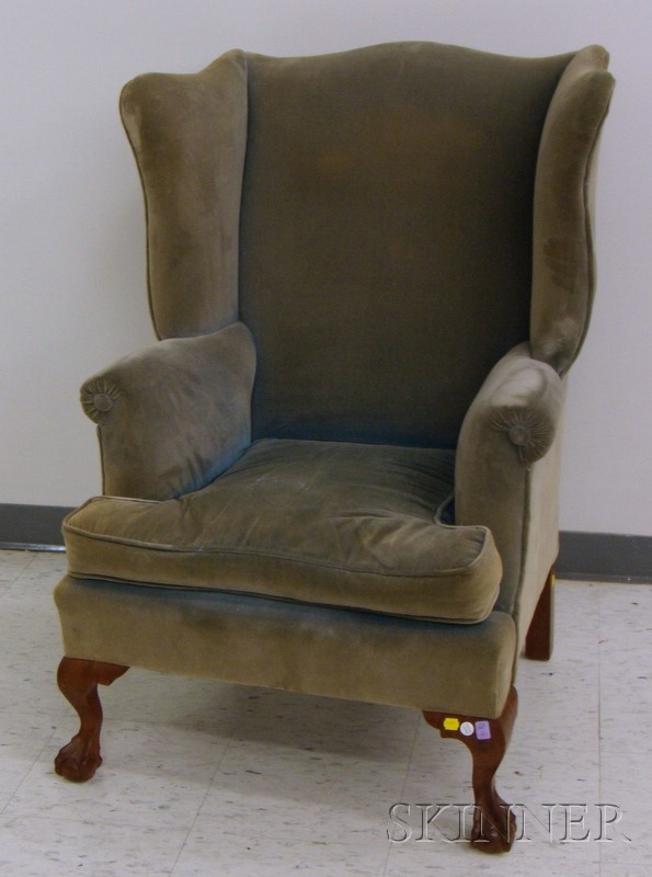 Appraisal: Chippendale-style Upholstered Carved Mahogany Wing Chair with Ball and Claw