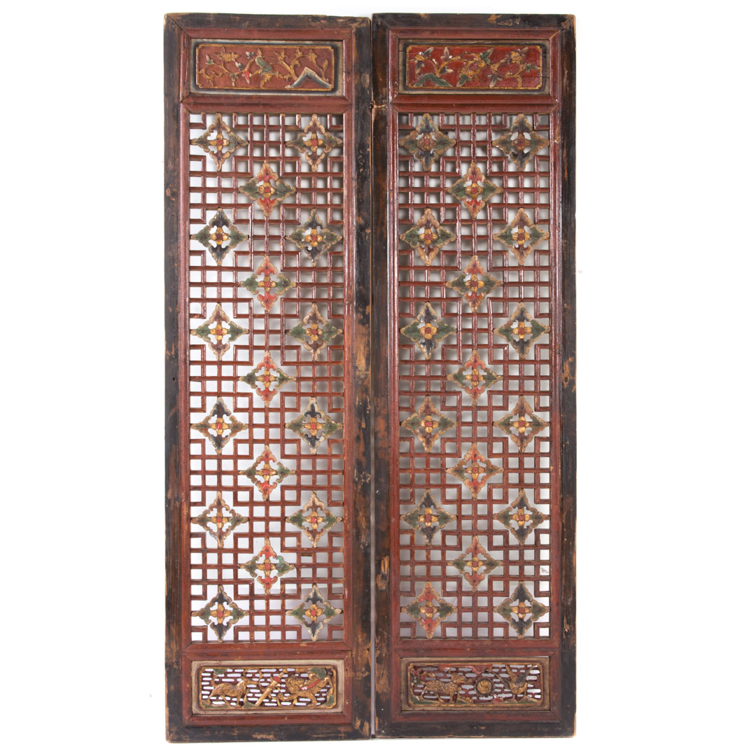 Appraisal: Pair Chinese carved wood panels late th century reticulated panels