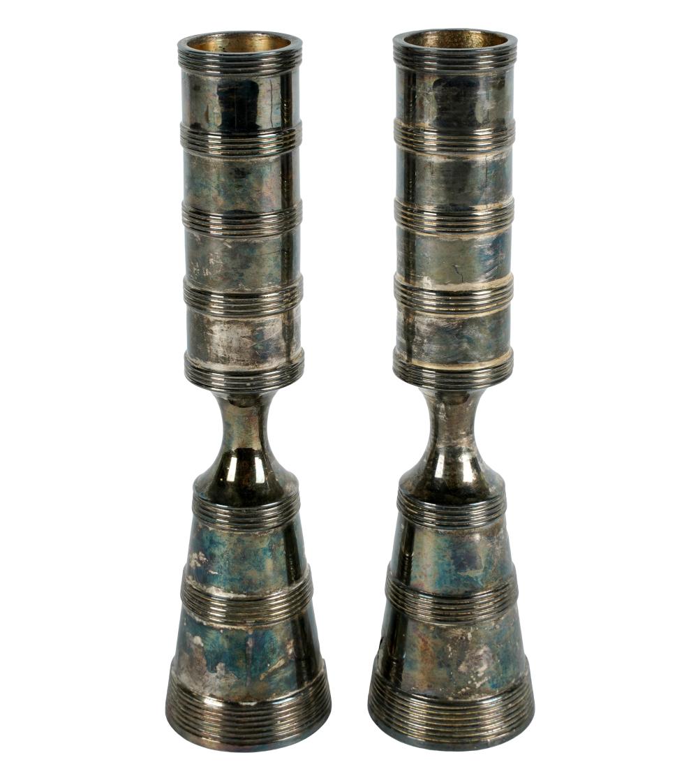 Appraisal: PAIR JENS QUISTGAARD DANISH MODERN SILVER-PLATE CANDLESTICKSeach marked Dansk Designs