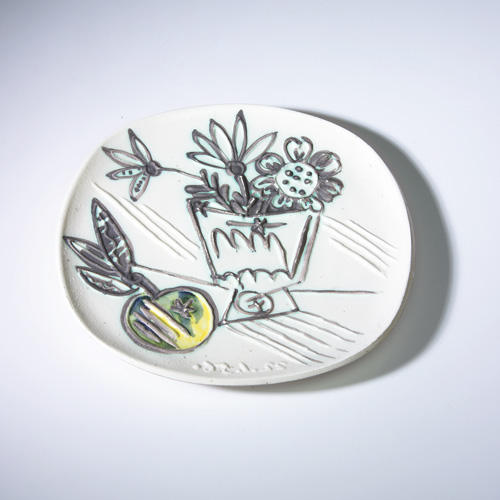 Appraisal: PICASSO MADAOURA Plate molded with a still life of flowers