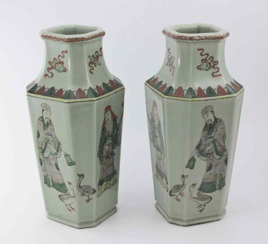 Appraisal: PAIR OF CHINESE CELADON GLAZE VASES Mirror image polychrome figures