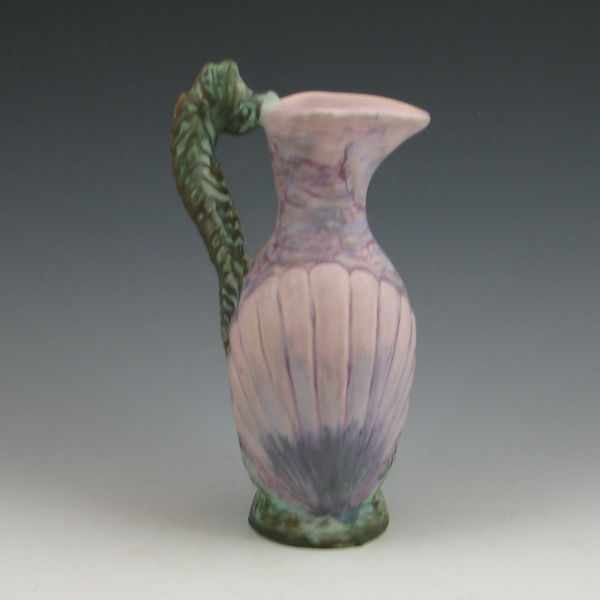 Appraisal: Weller Sabrinian ewer with seahorse handle Marked with faint Weller