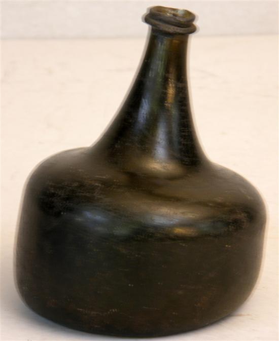 Appraisal: Green glass globular wine bottle th century with tapering neck