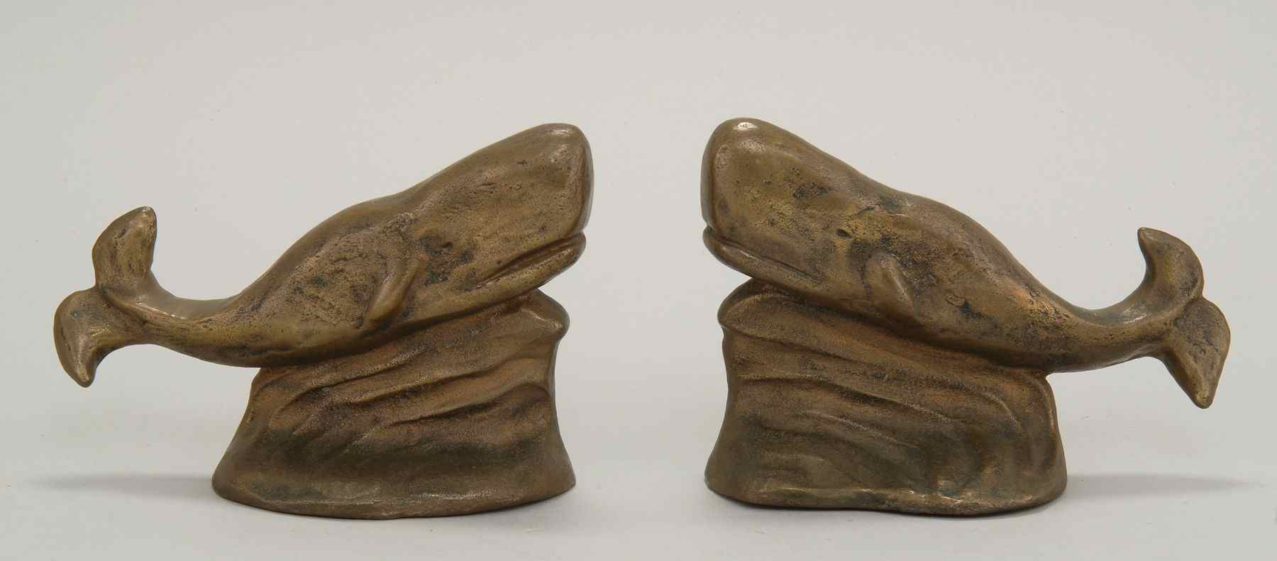 Appraisal: PAIR OF ROYALSTON ARTS WHALE-FORM BRASS BOOKENDSEach inscribed Royalston Arts