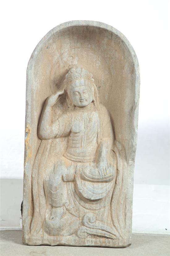 Appraisal: STONE SHRINE Asian th century Seated Quan Yin in an