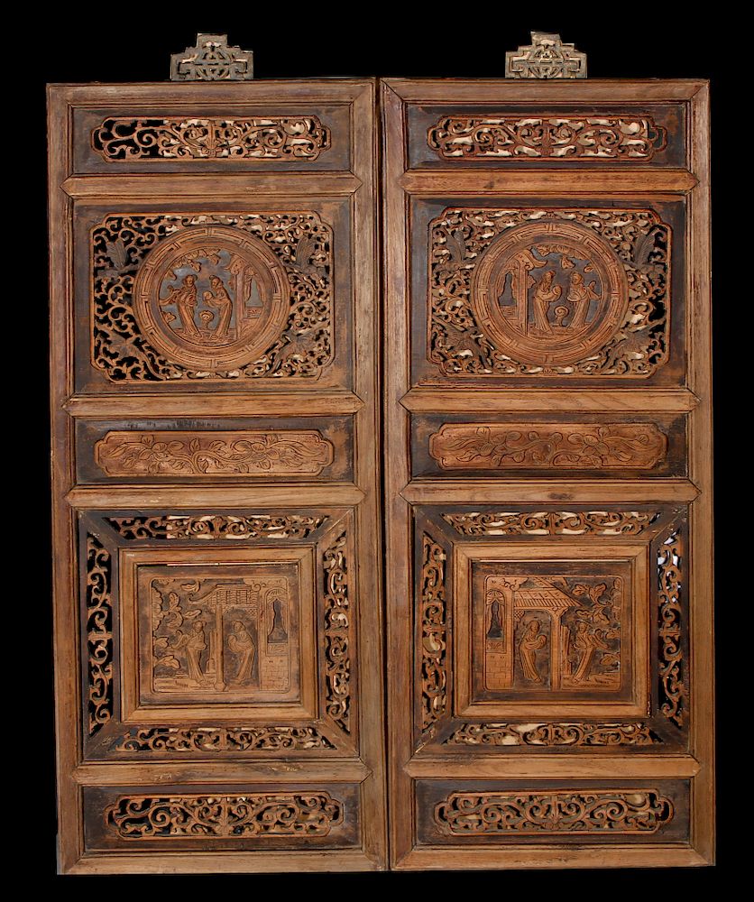 Appraisal: Pair of Carved Rosewood Panels Each rectangular panel carved with