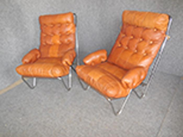 Appraisal: PAIR OF DANISH CHROME AND BROWN LEATHER ARMCHAIRS