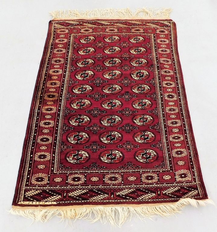 Appraisal: Bukara Red Geometric Rug Middle East Circa - Navy blue