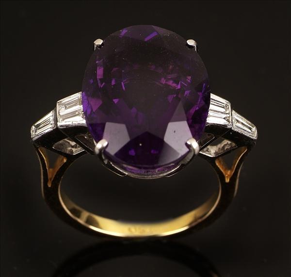 Appraisal: An amethyst and diamond ring the central large oval mixed