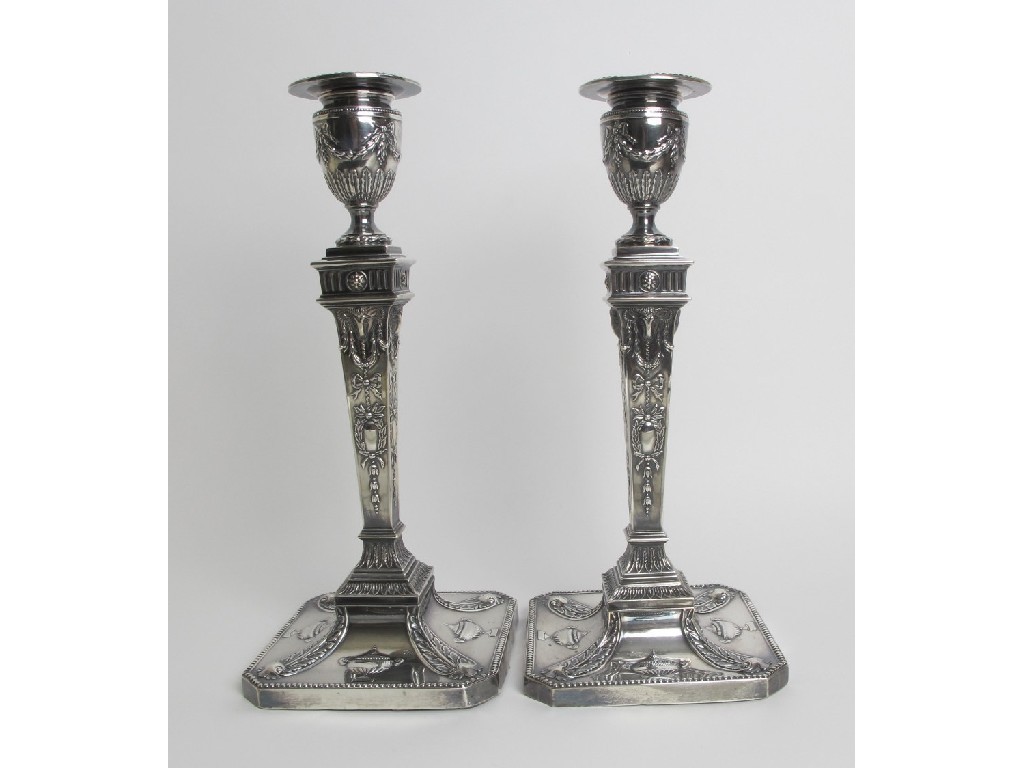 Appraisal: A pair of matching silver Adam style candl