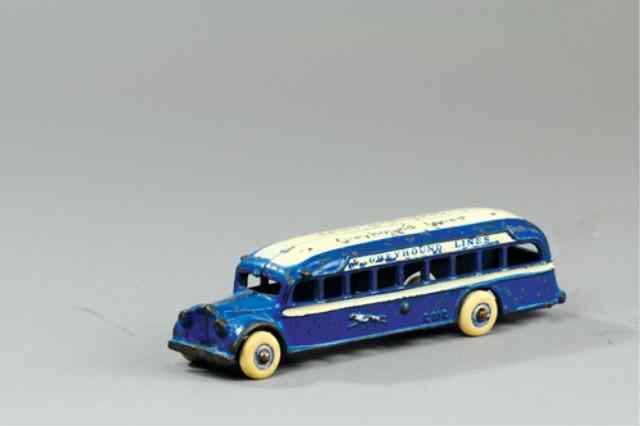 Appraisal: ARCADE GMC GREYHOUND BUS Stenciled ''Greyhound Lines'' on roof cast