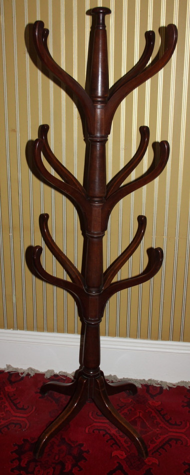 Appraisal: An early thC mahogany hat or coat stand with central