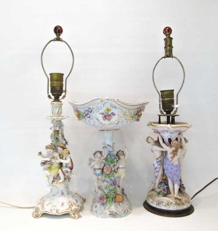 Appraisal: TWO FIGURAL PORCELAIN LAMPS AND CENTERPIECE the centerpiece marked Dresden