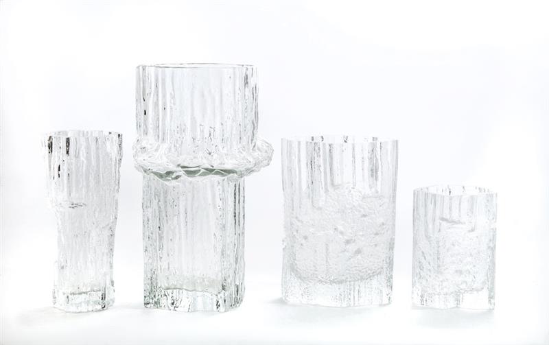 Appraisal: TAPIO WIRKKALA FOR ITTALA FOUR VASES Molded glass three marked