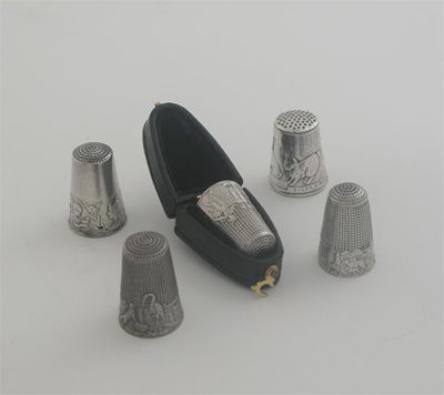 Appraisal: Five various thimbles with either a fable or a pictorial