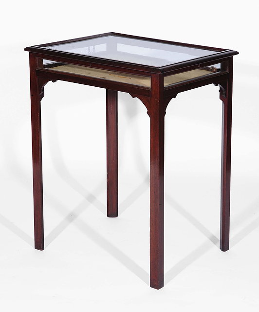 Appraisal: A mahogany bijouterie tablewith glass top and sides