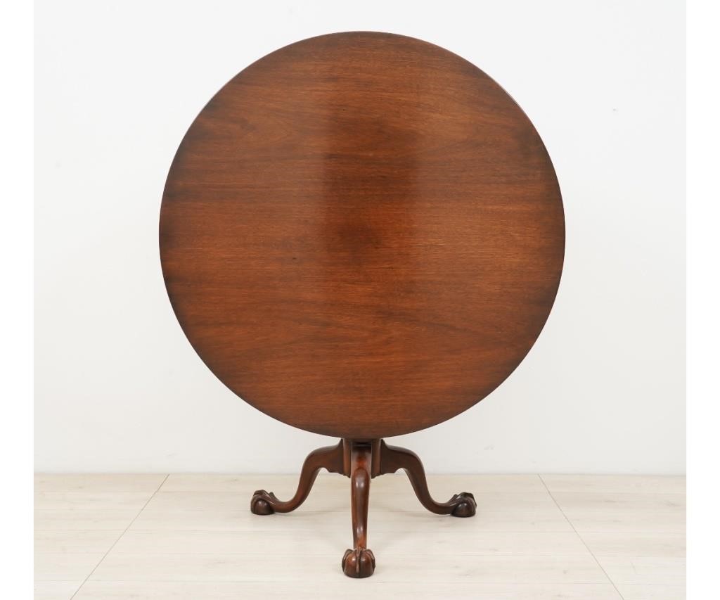 Appraisal: Kittinger Chippendale style mahogany tea table with finely carved ball