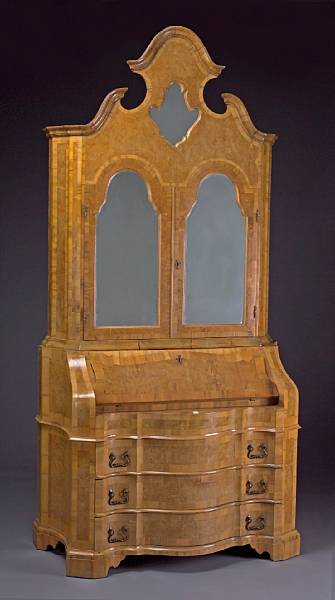 Appraisal: A German Baroque style walnut secretary bookcase th century In