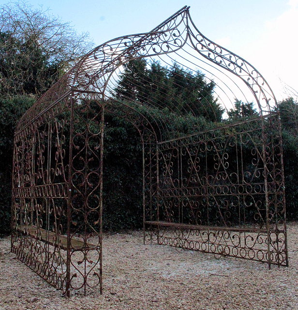 Appraisal: A WROUGHT IRON ROSE ARCH with scroll decoration to the