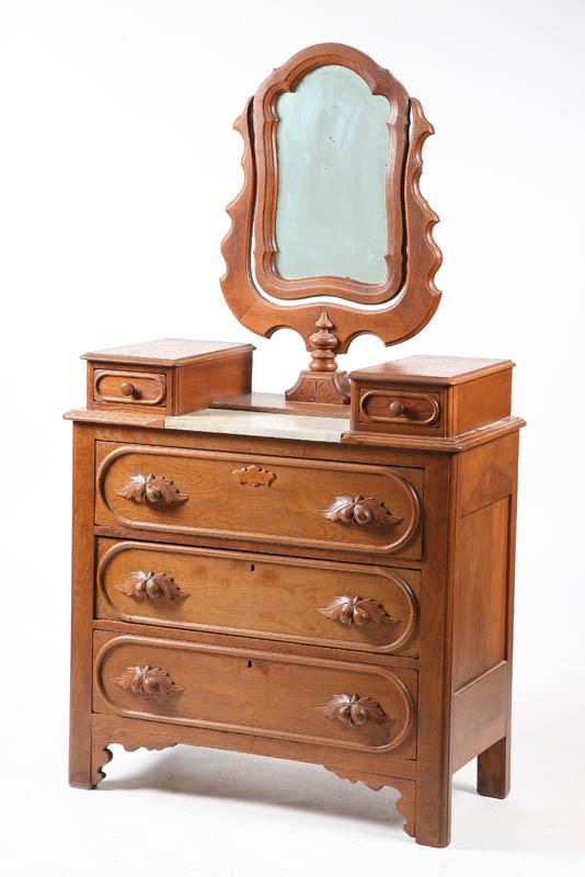 Appraisal: VICTORIAN CHEST Walnut with a scalloped mirror two paneled handkercheif