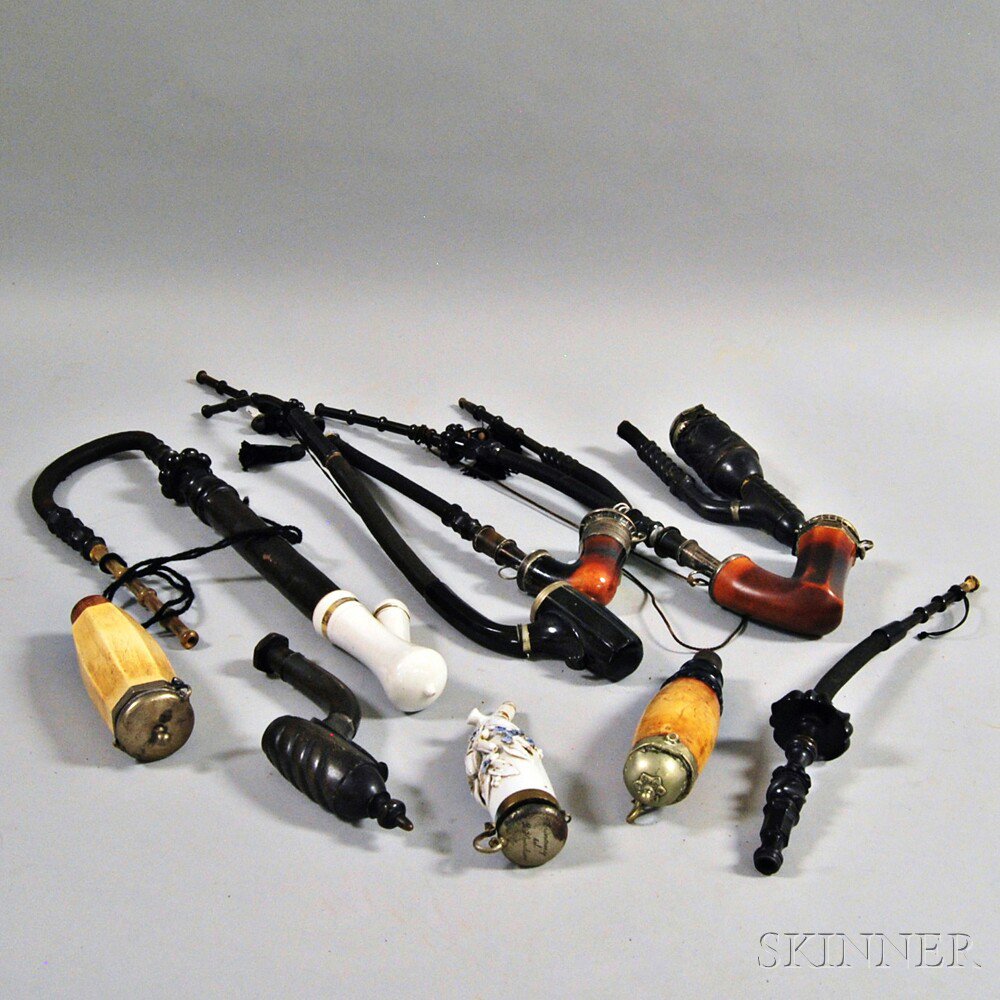 Appraisal: Five Pipes Four Bowls and a Tube including a pipe