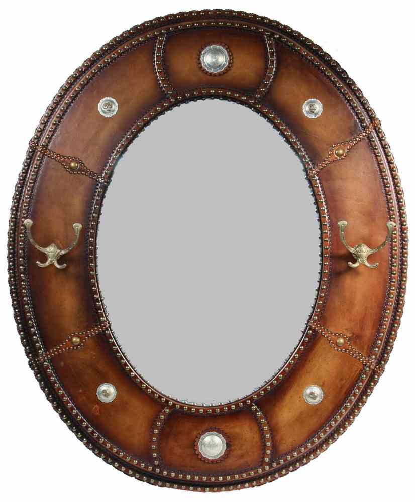 Appraisal: MIRROR - Custom western style oval hall mirror hand tooled