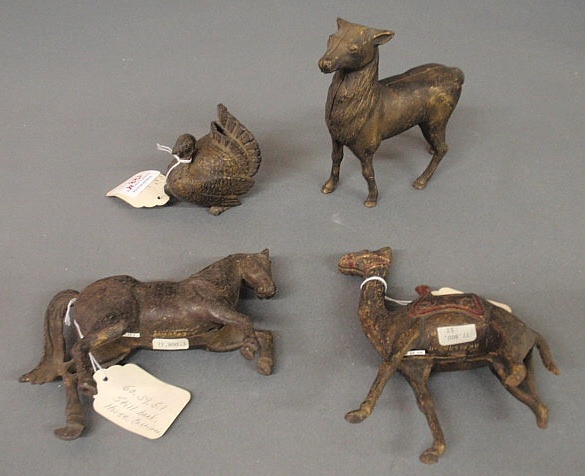 Appraisal: Four Victorian cast iron animal still banks