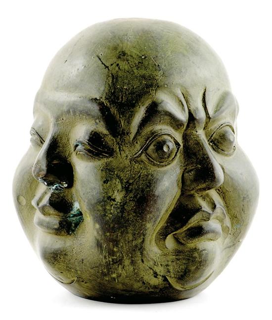 Appraisal: Chinese cast-metal sculpture of the four faces of life rotating