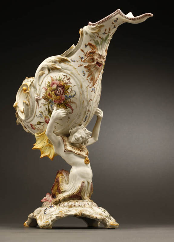 Appraisal: A Continental majolica figural centerpiece Triton A Continental majolica figural