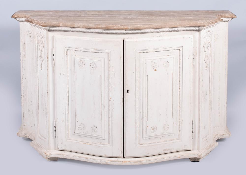 Appraisal: FRENCH PROVINCIAL STYLE WHITE PAINTED CABINET the serpentine molded top