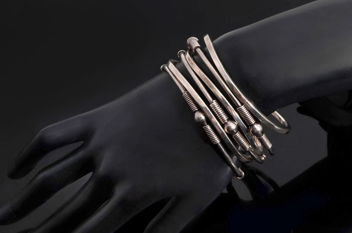 Appraisal: SILVER STACKING BRACELETS bracelets have a simple wave form to