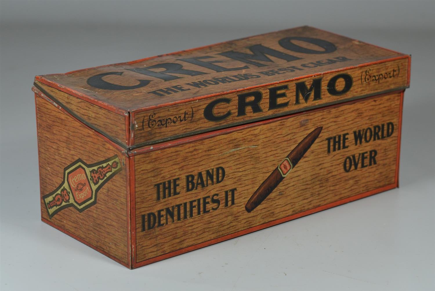 Appraisal: Lithographed tin Cremo The World's Best Cigar store tin back