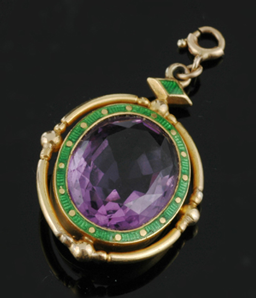 Appraisal: An Edwardian Suffragette pendant The oval amethyst bezel set in