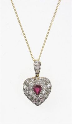 Appraisal: A ruby and diamond heart shaped pendant The pear shaped