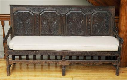 Appraisal: th Century-Style Carved Oak Paneled Settle Comprised of antique and