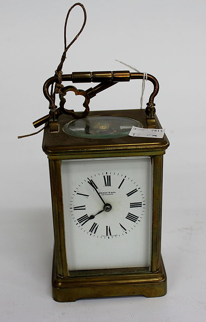 Appraisal: A FOUR GLASS BRASS CARRIAGE TIMEPIECE with a French movement