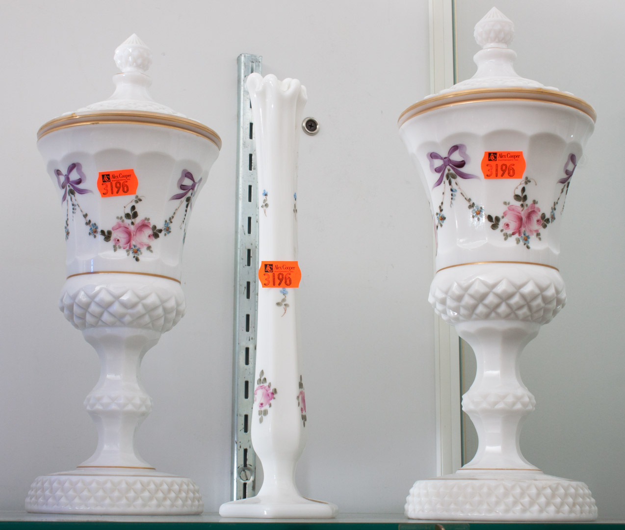 Appraisal: Pair of Westmoreland milk glass urns and rose vase to