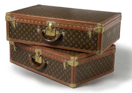 Appraisal: Two early th century Louis Vuitton vintage suitcases covered in