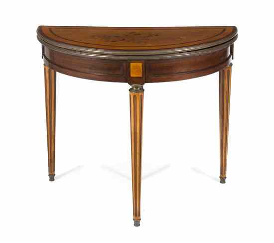 Appraisal: A Continental Marquetry Mahogany Games Table the demilune shaped top