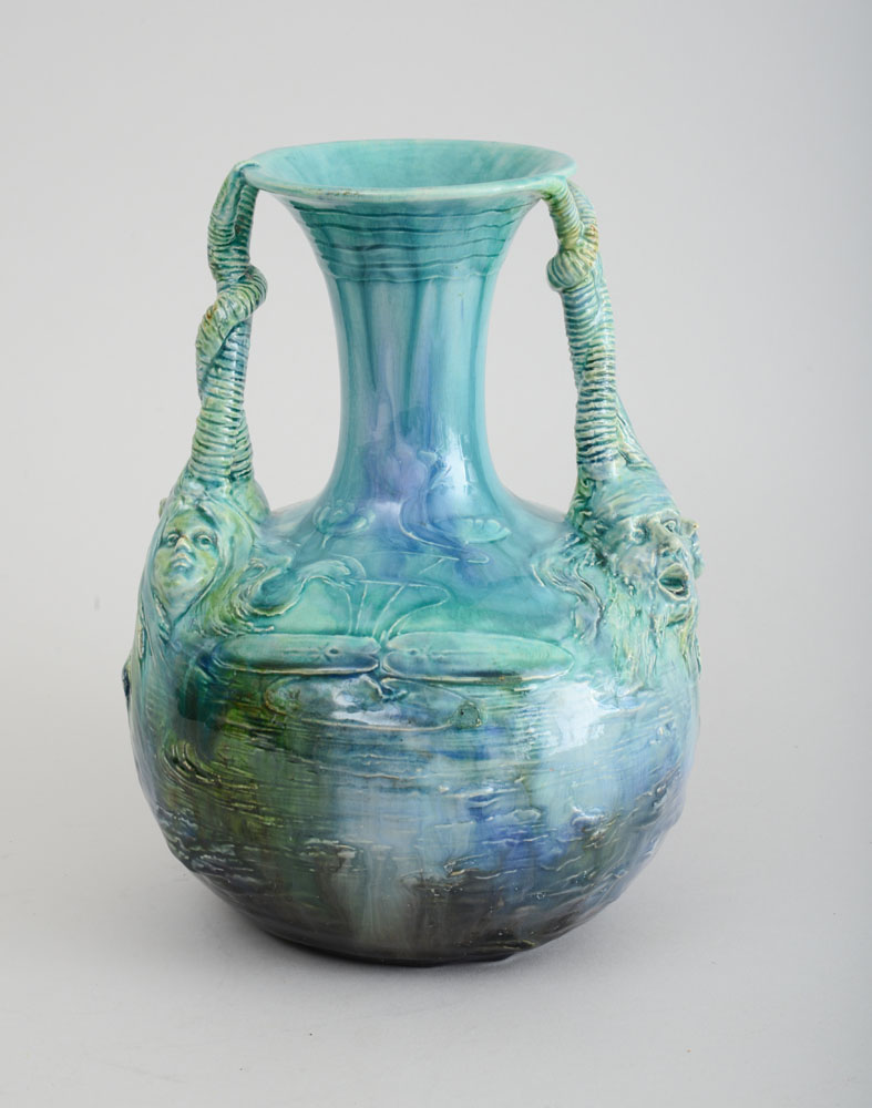 Appraisal: ART NOUVEAU TURQUOISE-TO-BLUE GLAZED POTTERY TWO-HANDLED VASE With raised monogram