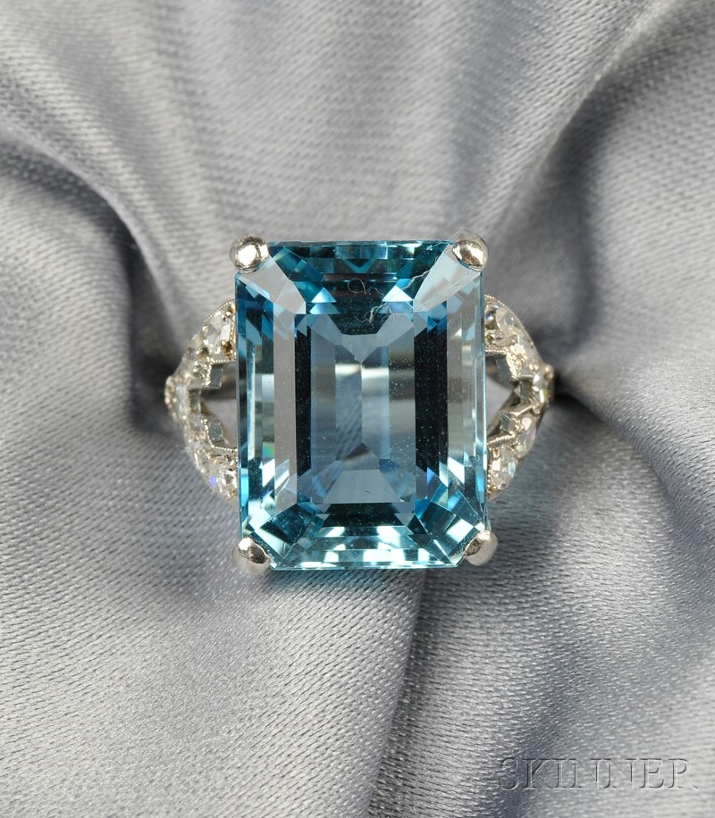 Appraisal: Platinum Aquamarine and Diamond Ring prong-set with a rectangular-cut aquamarine