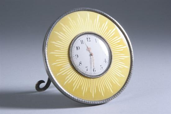 Appraisal: FABERG SILVER-MOUNTED AND YELLOW GUILLOCH ENAMELLED DESK CLOCK Faberg and