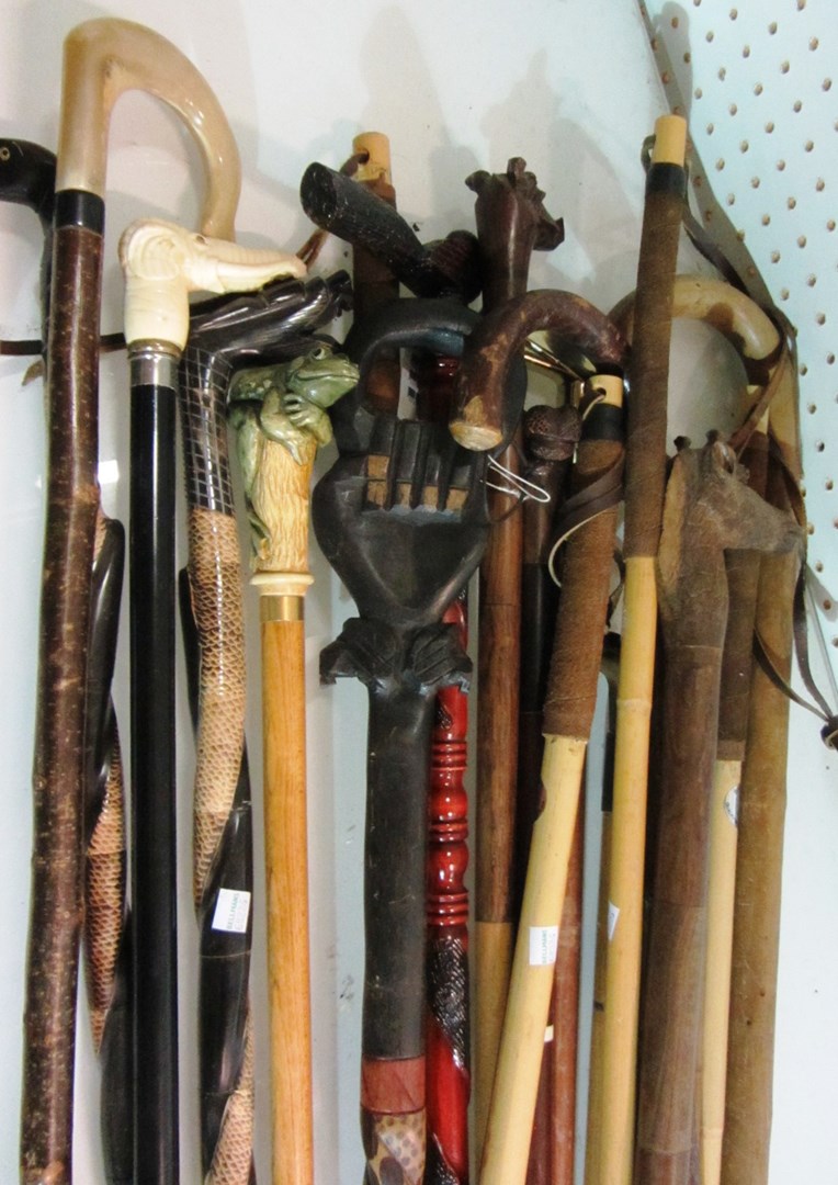 Appraisal: A group of twenty various walking sticks