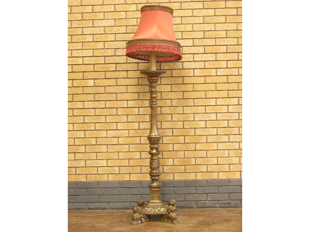 Appraisal: A large giltwood and painted Standard Lamp with leafage column