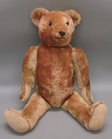 Appraisal: Vintage rose pink mohair bear Brown glass eyes elongated snout