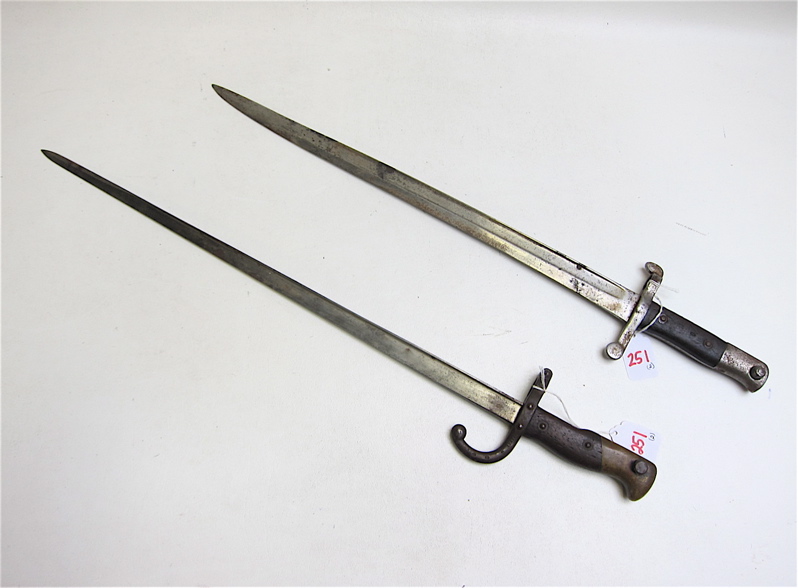 Appraisal: TWO RIFLE BAYONETS Steyr model blade with deep fuller birds