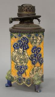 Appraisal: Majolica oil lamp mounted with brass and brass duplex font