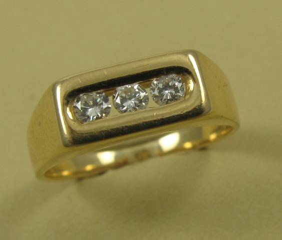 Appraisal: THREE DIAMOND RING K yellow gold the three round-cut diamonds