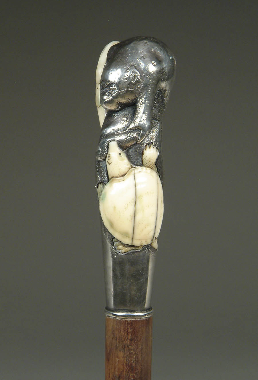 Appraisal: JAPANESE SILVER AND IVORY CANE WITH ANIMALS This most unusual