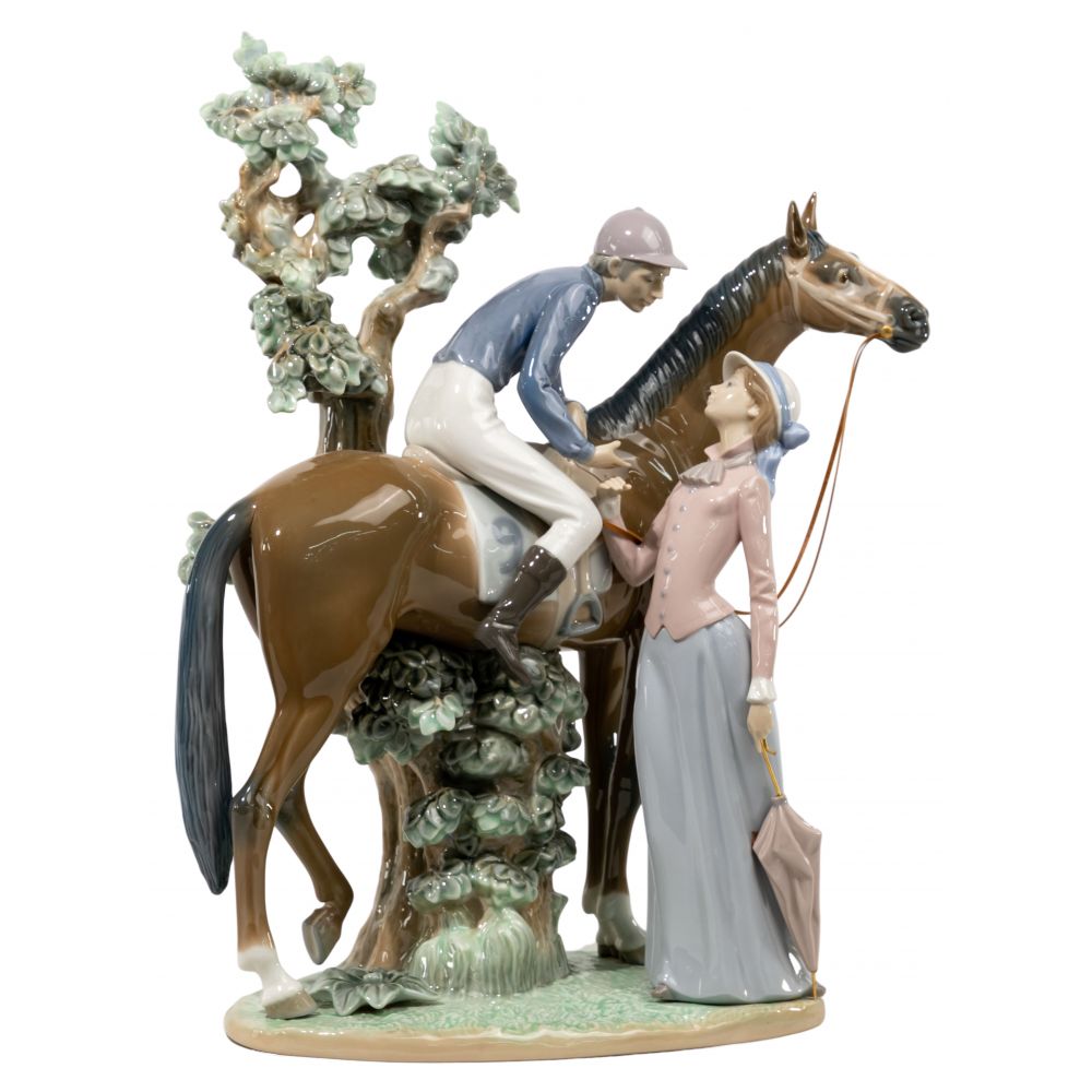 Appraisal: LLADRO JOCKEY WITH LASS FIGURINERetired